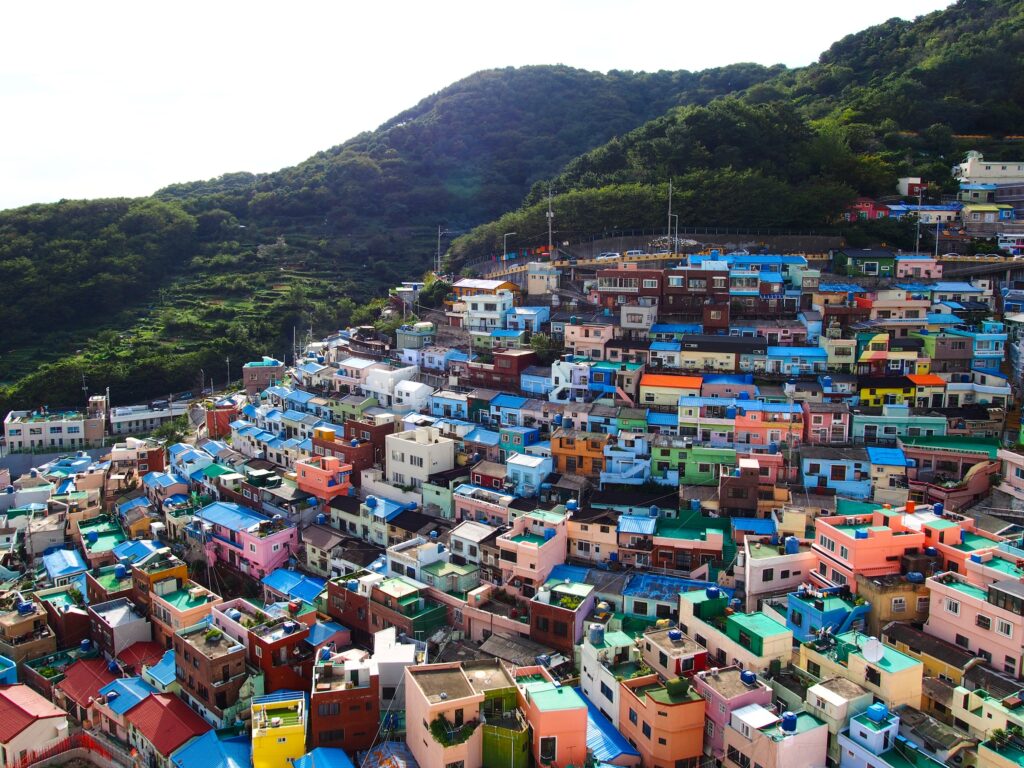 Photo of Busan Gamcheon Culture Village, South Korea featuring brightly coloured houses along a hillside/mountainside.