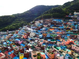 Photo of Busan Gamcheon Culture Village, South Korea featuring brightly coloured houses along a hillside/mountainside.