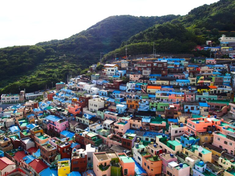 Photo of Busan Gamcheon Culture Village, South Korea featuring brightly coloured houses along a hillside/mountainside.